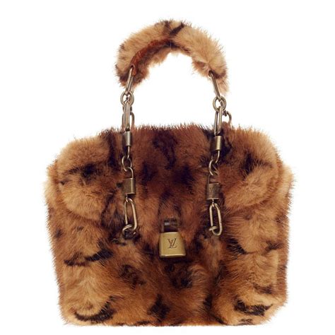 louis vuitton mink papillon bag|capucines mini bag.